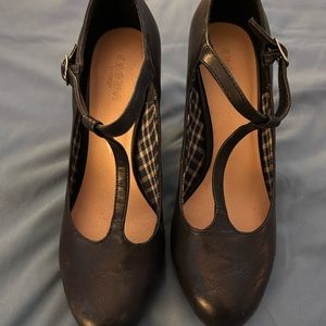 Black leather heels with wood stacked heel